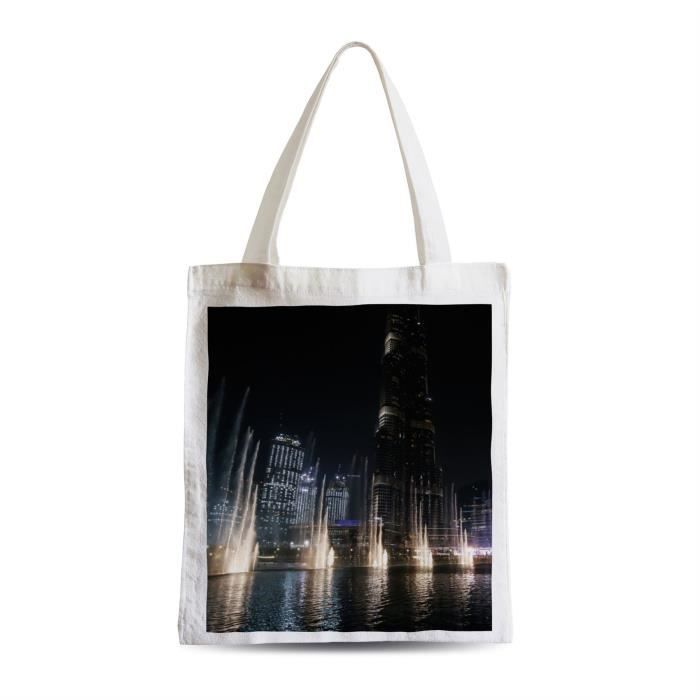 Big bag shopping beach student at night fountain in front of dubai