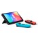 Nintendo Switch OLED gaming Console with Neon Blue and Red joy-con controllers in table top mode